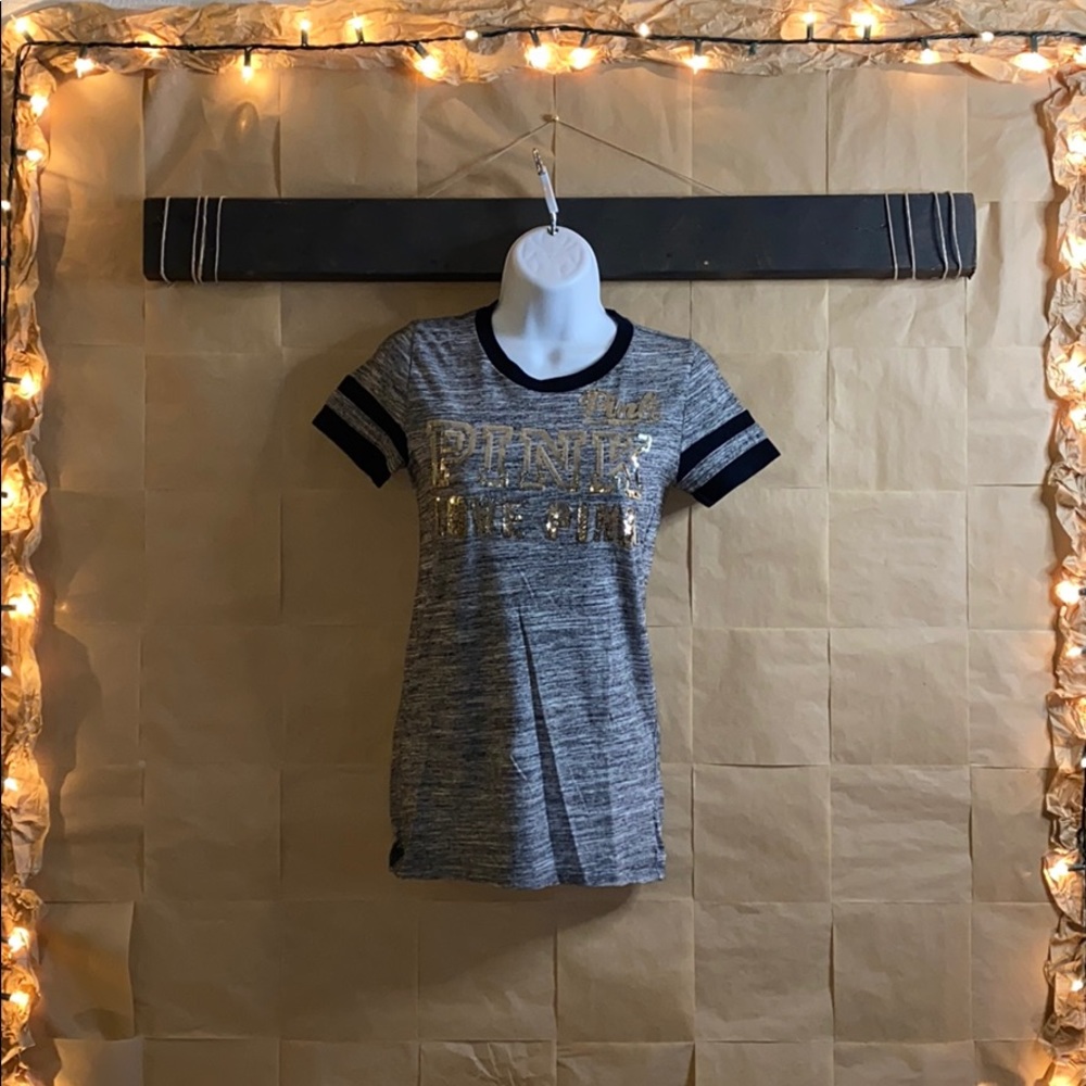 Pink shirt with sparkly gold lettering